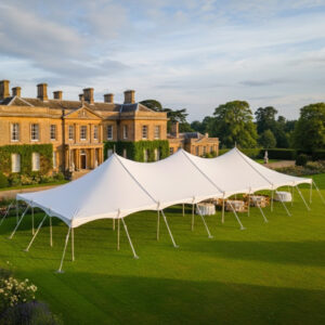 9m x 24m traditional marquee white pvc in a manor house garden