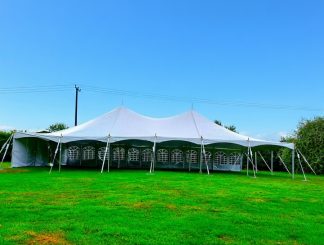 9x18m traditional marquee set up for a wedding on a sunny day